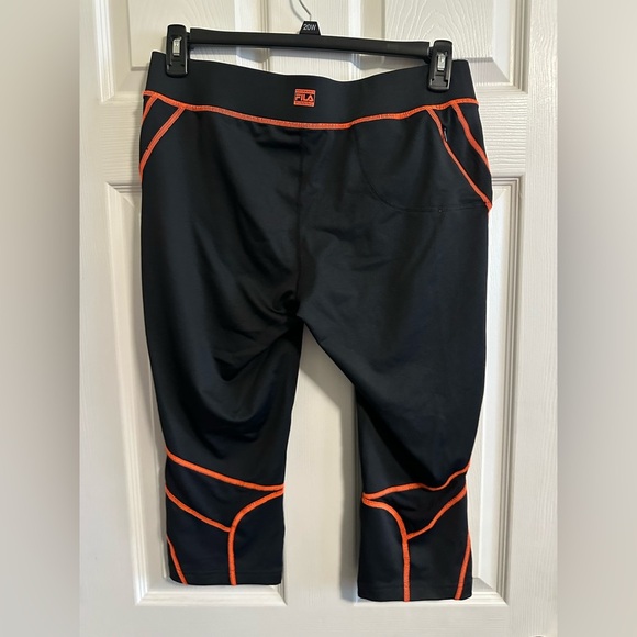 Fila Sport Running Capri Legging zipper pocket - black with orange accent Large - Picture 2 of 3